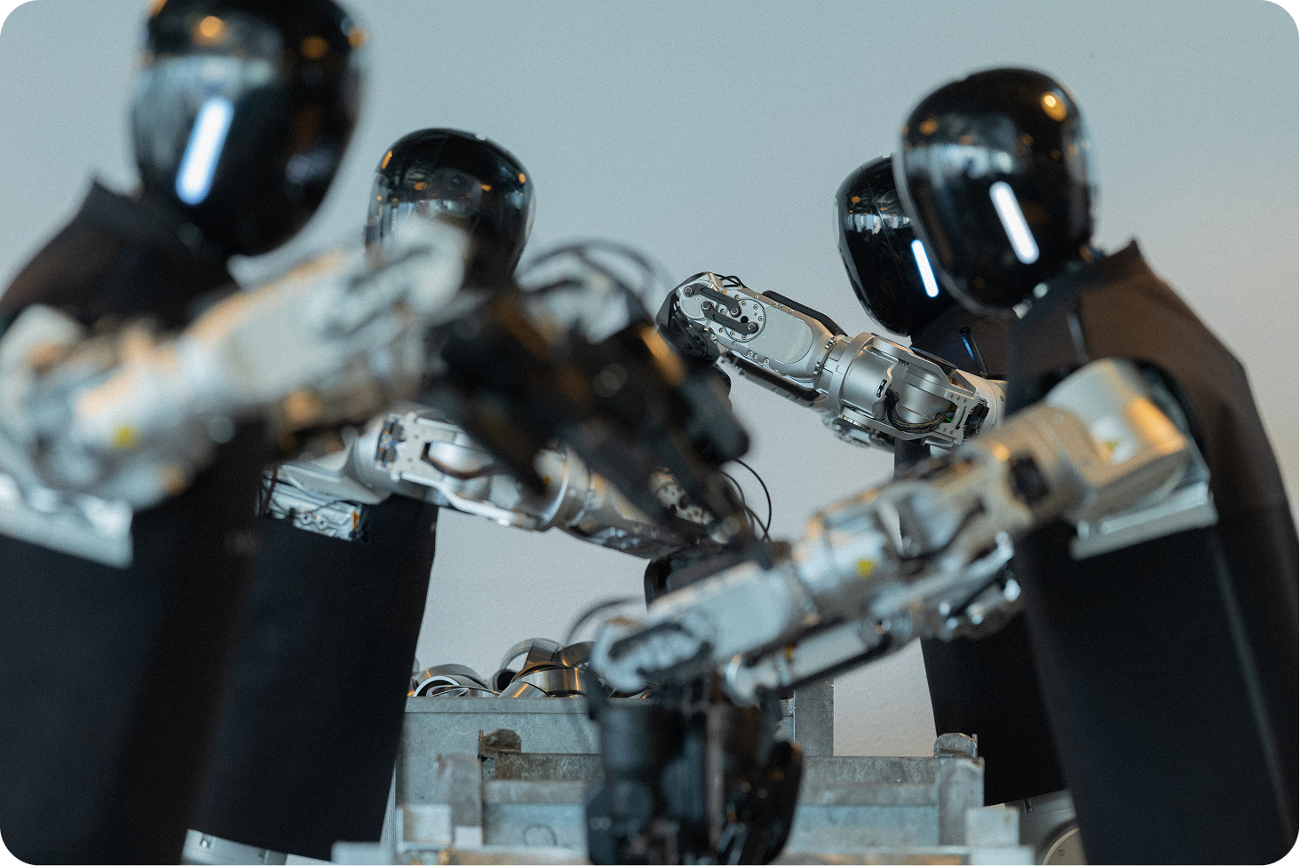 Close-up of humanoid robots operating as an industrial fleet