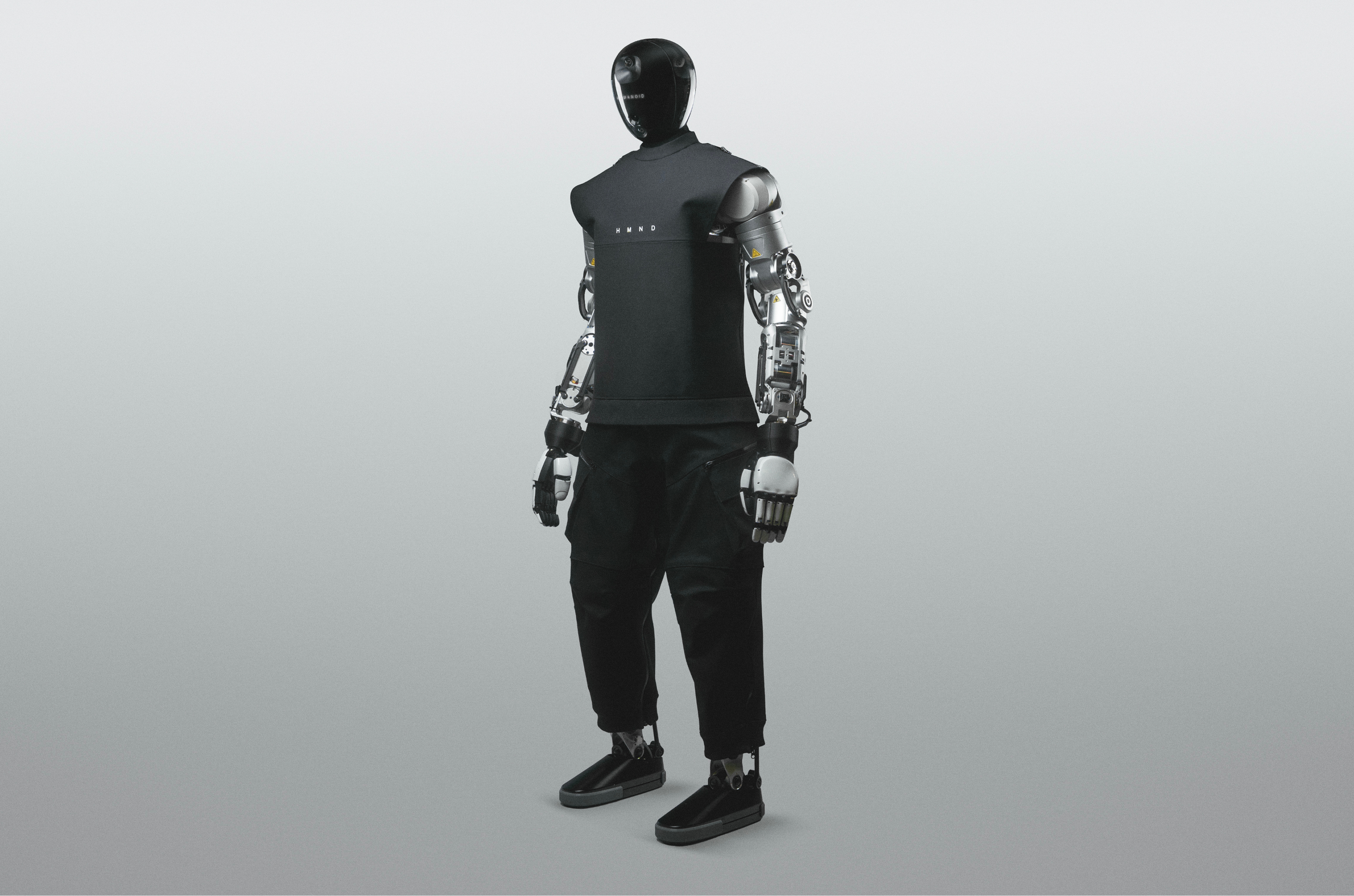 Alpha Wheeled humanoid robot in a dark blue studio